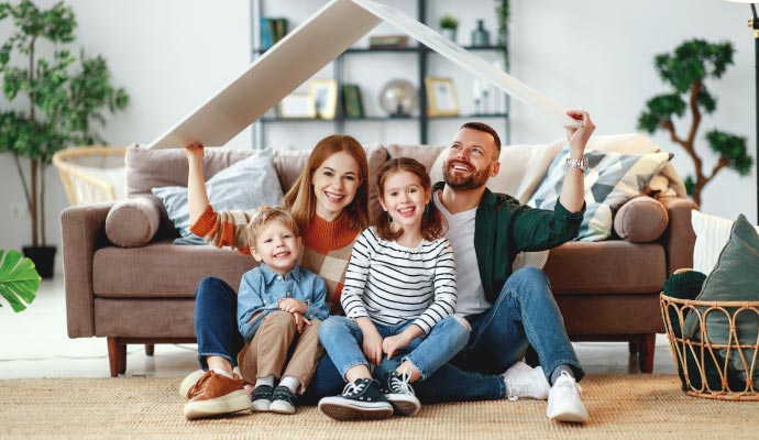 Family enjoying fresh air in room Happy family enjoying fresh air in a clean room