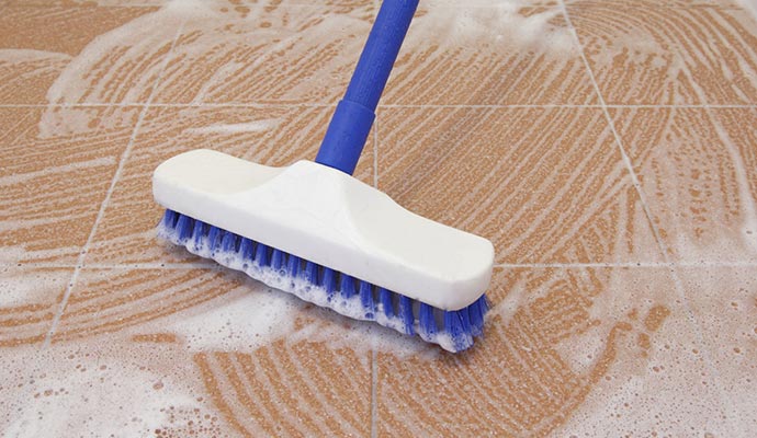 https://www.dalworth.com/images/floor-tile-and-grout-cleaning-with-brush.jpg