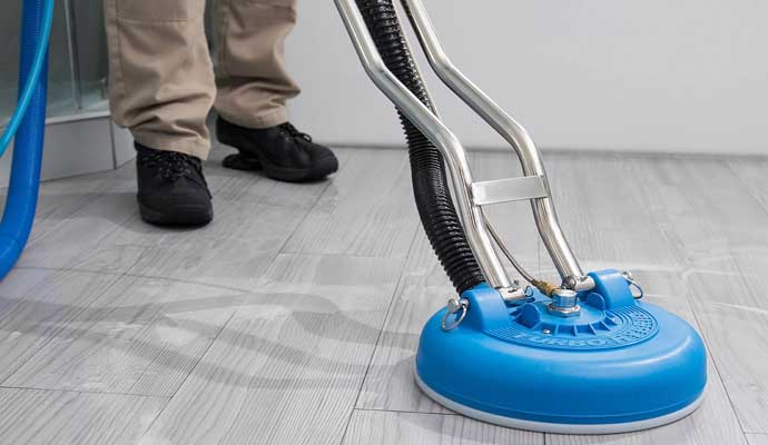 Marble floor getting polished with a specialized machine